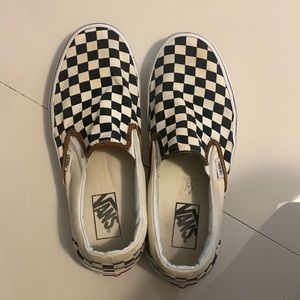 Checkered slip on black and white Vans
